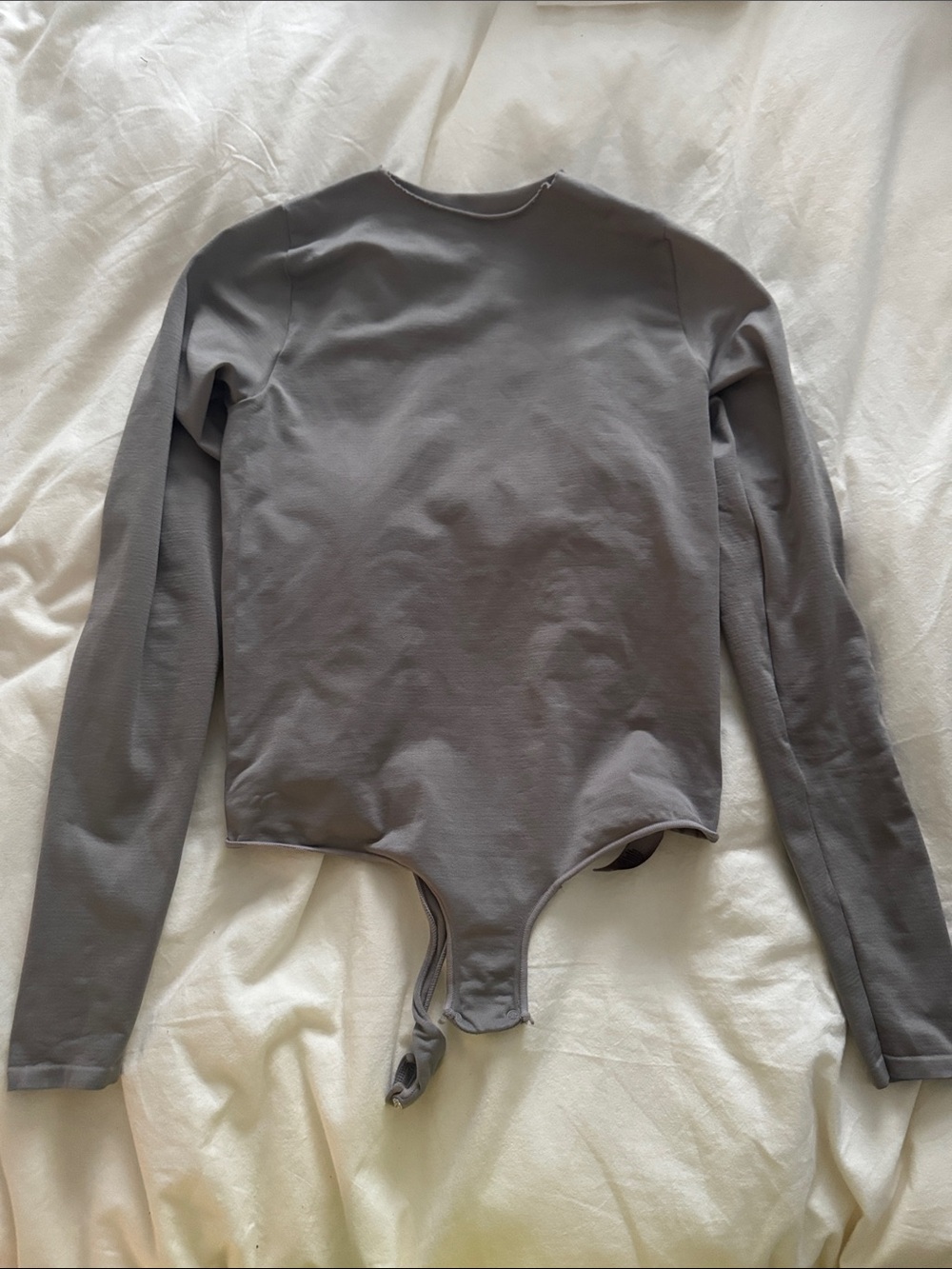 Skims long sleeve body suit